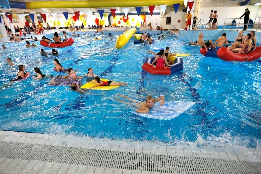 Kid splaying in the pool at Todd Energy Aquatic Centre